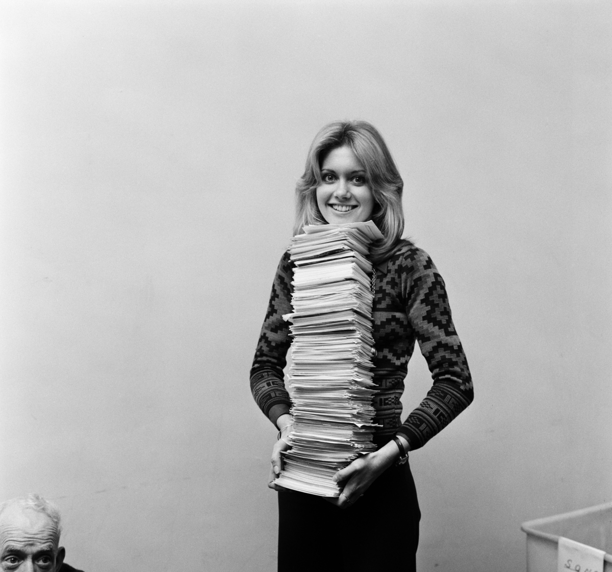 Olivia Newton-John counting votes to see which song viewers had voted for her to sing at the Eurovision Song Contest in Brighton on April 6th. The final count will be completed tomorrow and the result announced by Bill Cotton, Head of BBC TV Light Entertainment on BBC1’s “Clunk-Click” on Saturday. 28th February 1974.Freddie Reed/Mirrorpix via Getty Images
