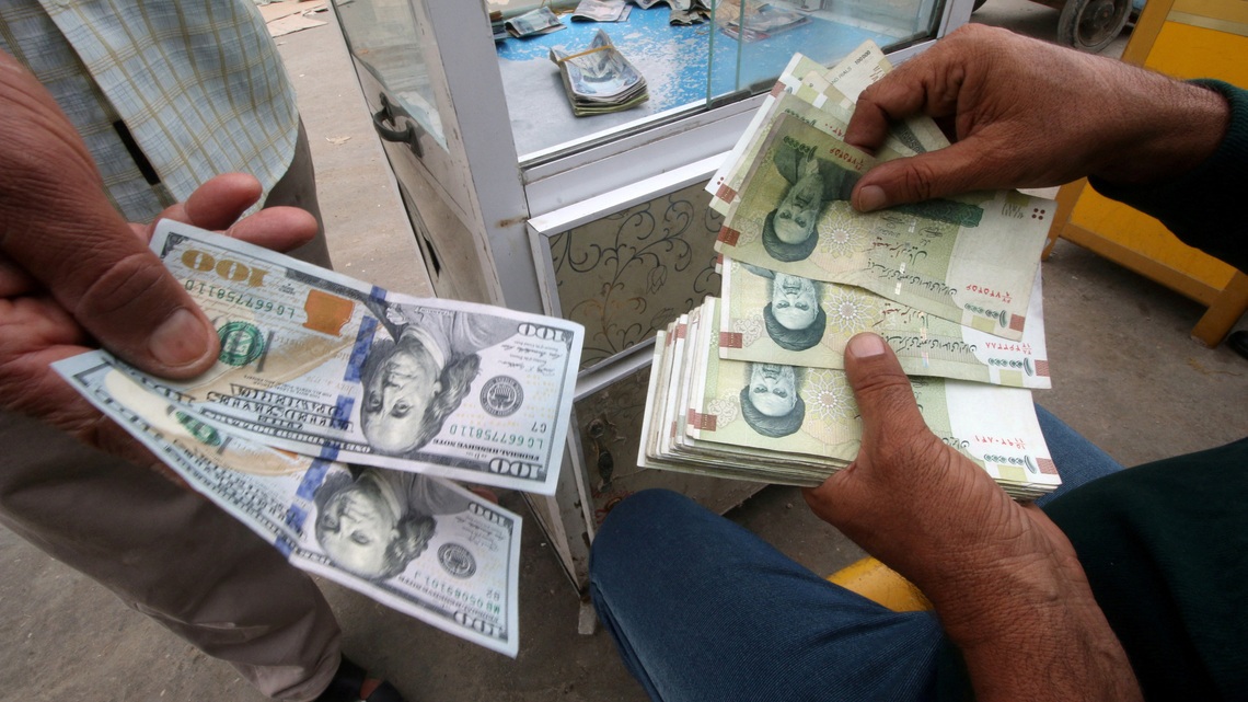 Iraq devalues dinar to 1,520 per US dollar, state news agency says