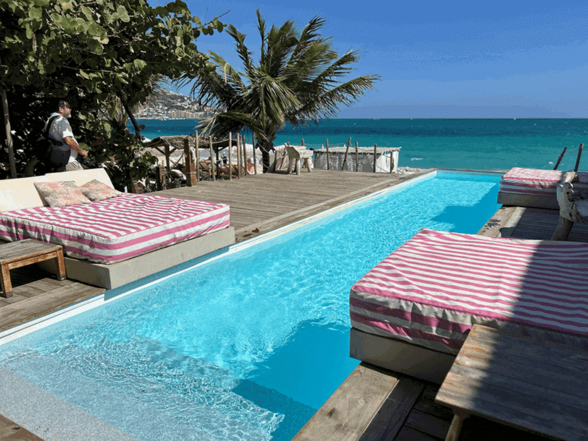 Cooling off in luxury at Babacool Beach Club, where private pools and daybeds provide the perfect chic escape from the afternoon sun. Photo credit: Lauren Harby 