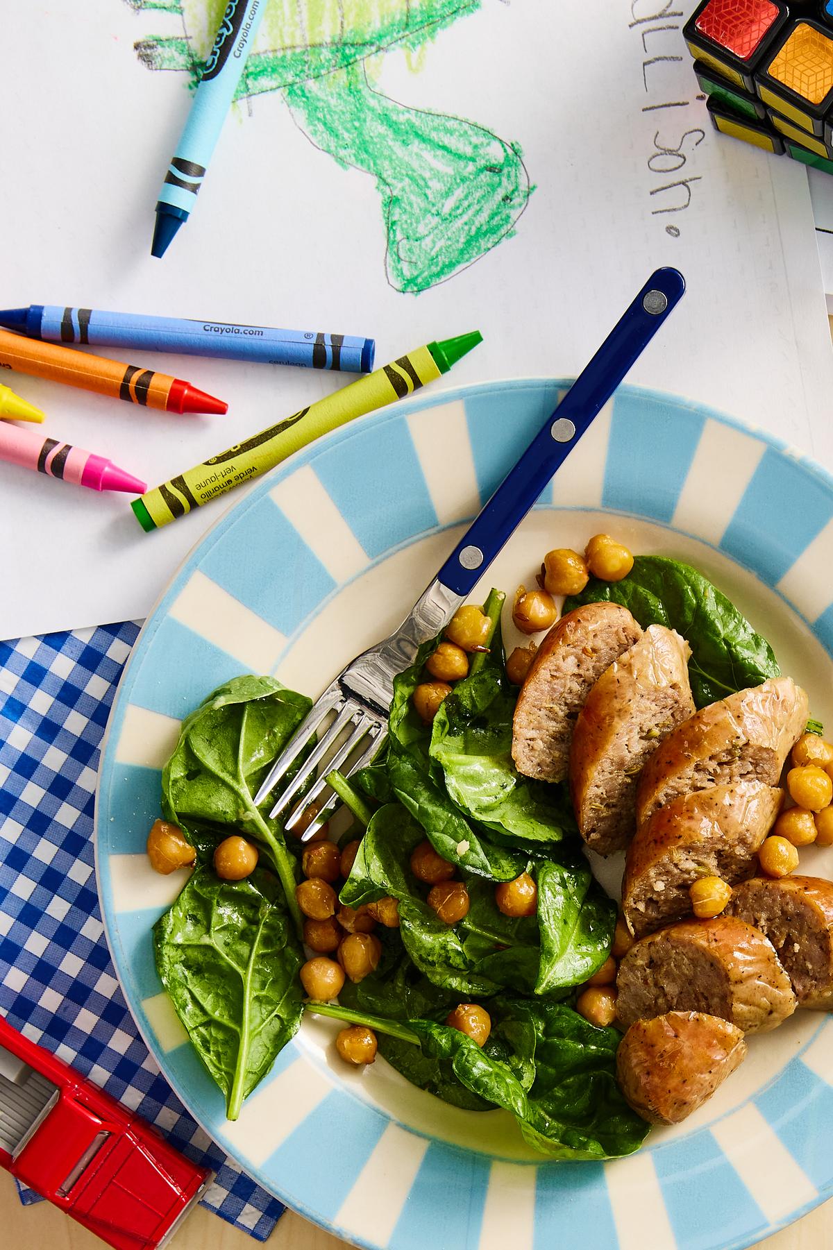 Roasted Sausages With Chickpeas and Spinach. End-of-school year chaos has arrived. These 20-minute (or less) meals will get you cooking through it. Food styled by Monica Pierini. Prop styled by Megan Hedgpeth. (Ryan Liebe/The New York Times)