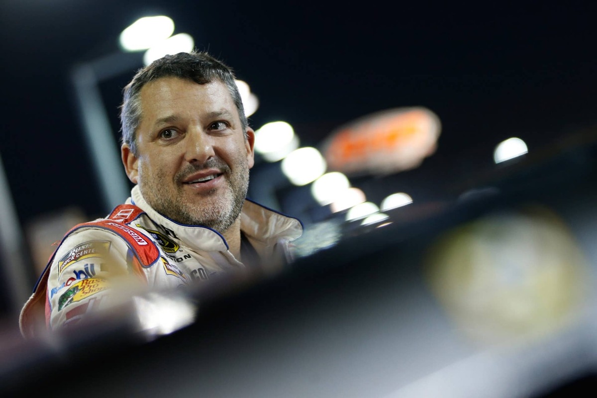  HOMESTEAD, FL - NOVEMBER 18: Tony Stewart, driver of the #14 Always a Racer/Mobil 1 Chevrolet, stands on the grid during qualifying for the NASCAR Sprint Cup Series Ford EcoBoost 400 at Homestead-Miami Speedway on November 18, 2016 in Homestead, Florida. (Photo by Brian Lawdermilk/Getty Images) 