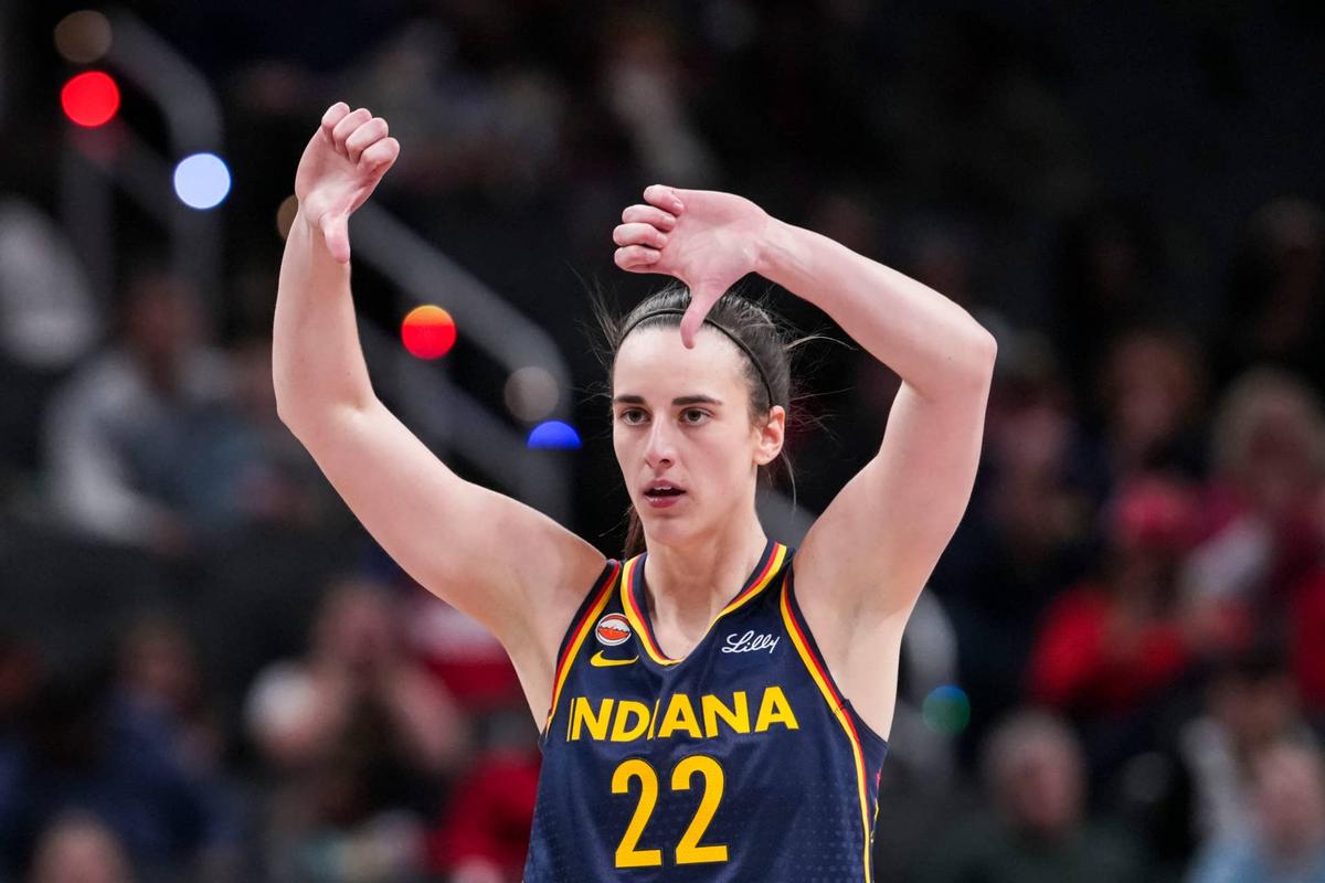  Indiana Fever guard Caitlin Clark gestures down the court Grace Smith/IndyStar / USA TODAY NETWORK via Imagn Images