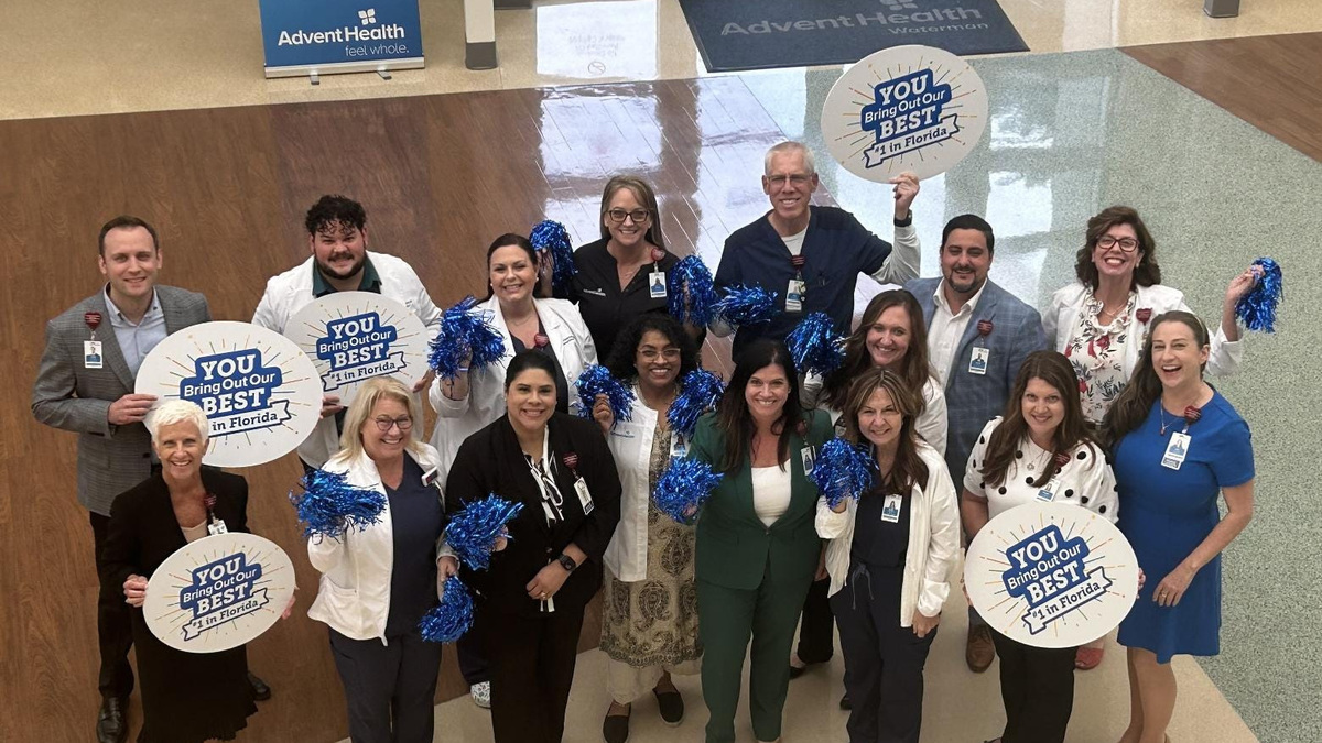 Medical personnel and executives celebrate new U.S. News & World Report Best Hospital rankings at AdventHealth Waterman.