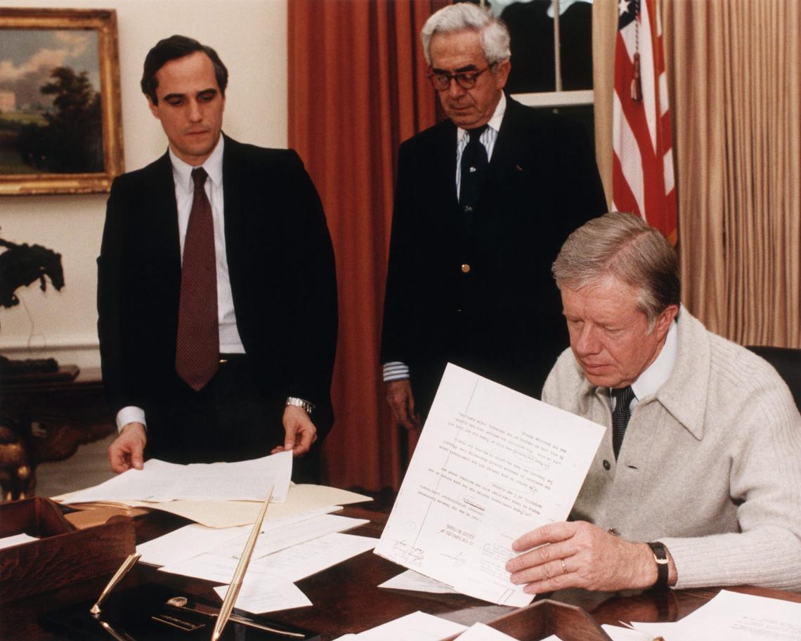  President Jimmy Carter, seen here at his Oval Office desk, signed legislation in 1978 that he said would ‘ensure that Presidential papers remain public property after the expiration of a President's term.' Corbis/Getty Images 