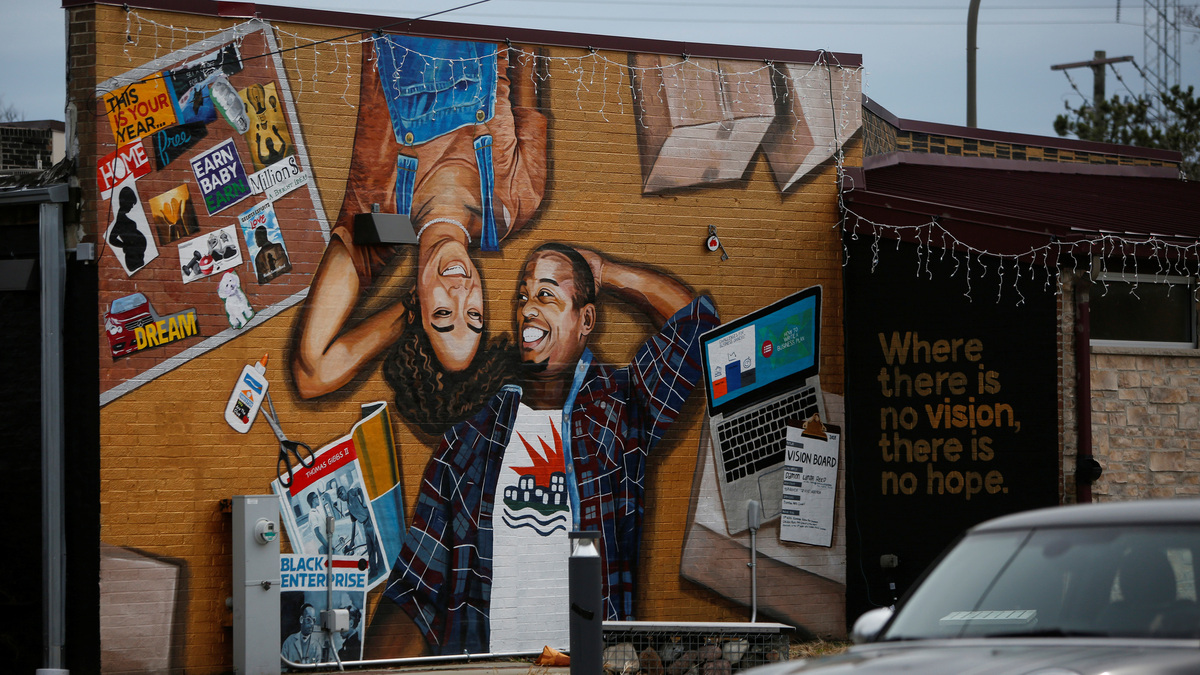 A mural is displayed on Litehouse Whole Food Grill on Dodge Avenue in the Fifth Ward, known as the historic Black community, in Evanston, Illinois, U.S., March 18, 2021. REUTERS/Eileen T. Meslar