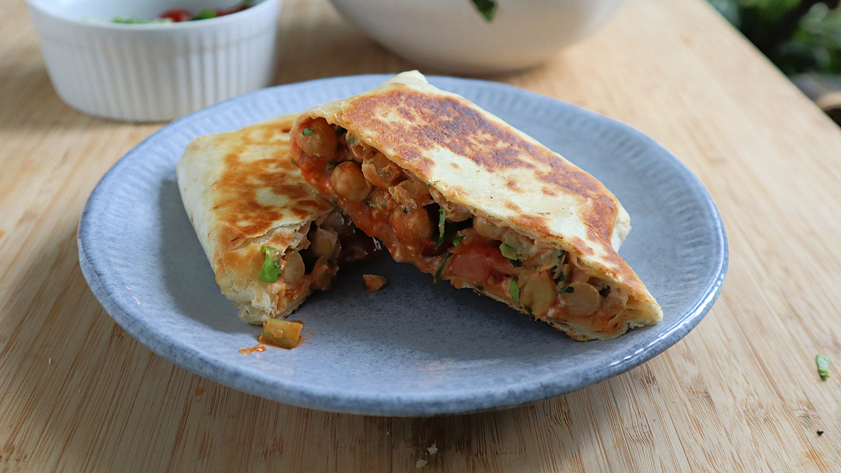 Canned chickpeas offer an inexpensive plant-based protein in these easy-to-make wraps.