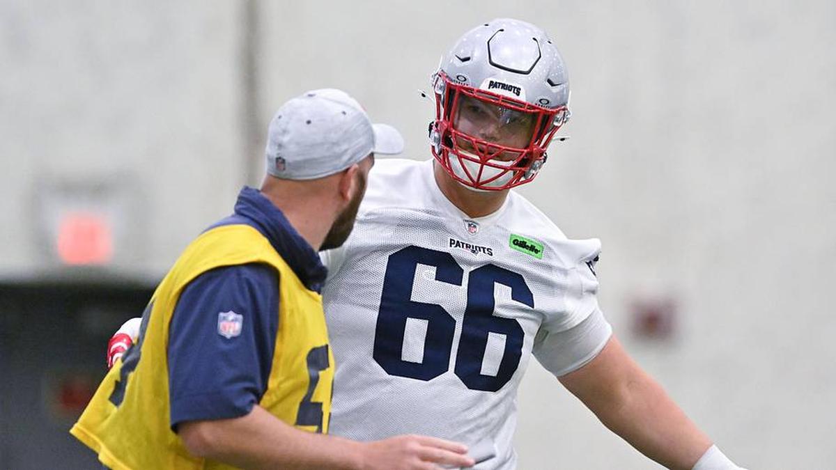  Jun 10, 2025; Foxborough, MA, USA; New England Patriots offensive tackle Will Campbell (66) works with a member of the coaching staff during minicamp held in the WIN Field House at Gillette Stadium. Mandatory Credit: Eric Canha-Imagn Images | Eric Canha-Imagn Images 