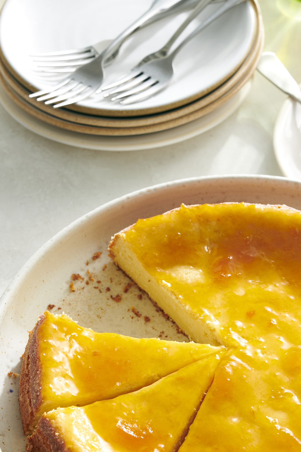 Lemon ricotta cake. A finish of apricot preserves adds a beautiful sheen to the top of this simple lemony cake. Food styled by Cyd Raftus McDowell. (David Malosh/The New York Times)