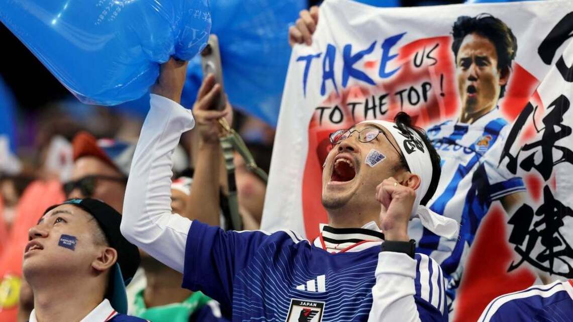 Continuing tradition, fans of Japan clean up postgame 