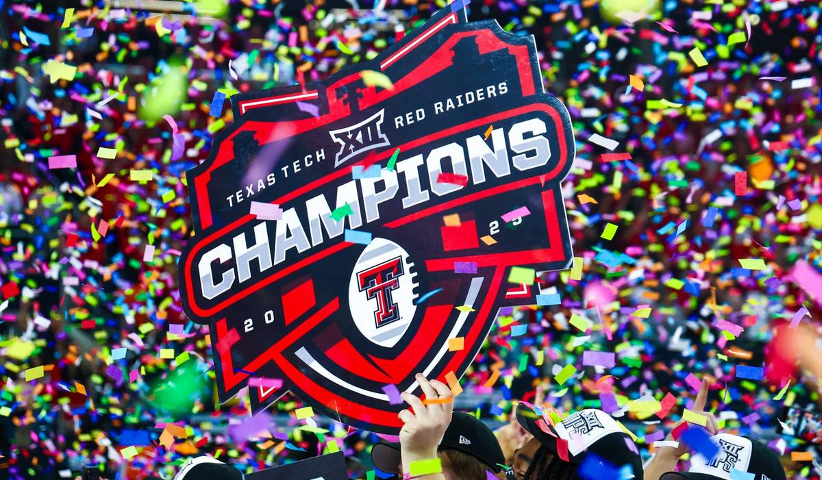  A Texas Tech Big 12 Championship sign is held up after the game against the BYU Cougars at AT&T Stadium on Dec. 6, 2025, in Arlington, Texas. © Kevin Jairaj-Imagn Images