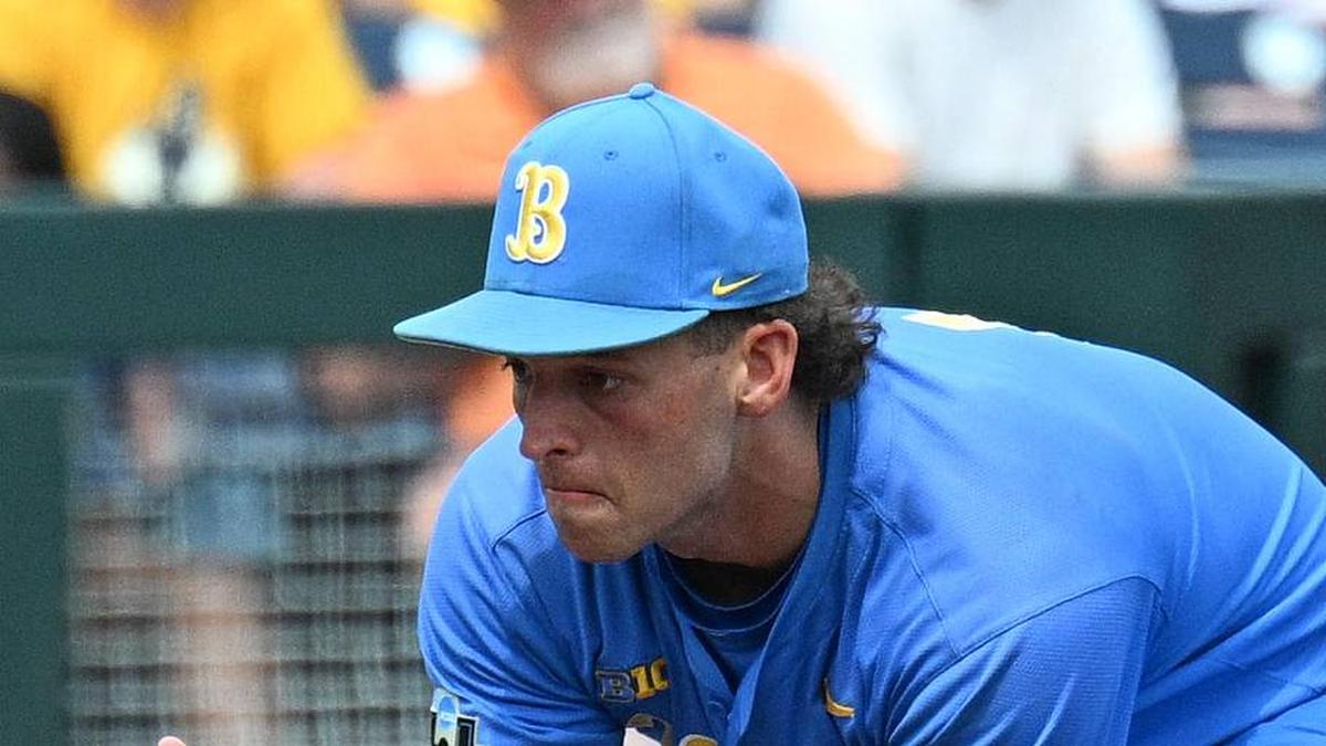  Jun 14, 2025; Omaha, Neb, USA; UCLA Bruins shortstop Roch Cholowsky (1) fields a ground ball against the Murray State Racers during the ninth inning at Charles Schwab Field. Mandatory Credit: Steven Branscombe-Imagn Images | Steven Branscombe-Imagn Images 