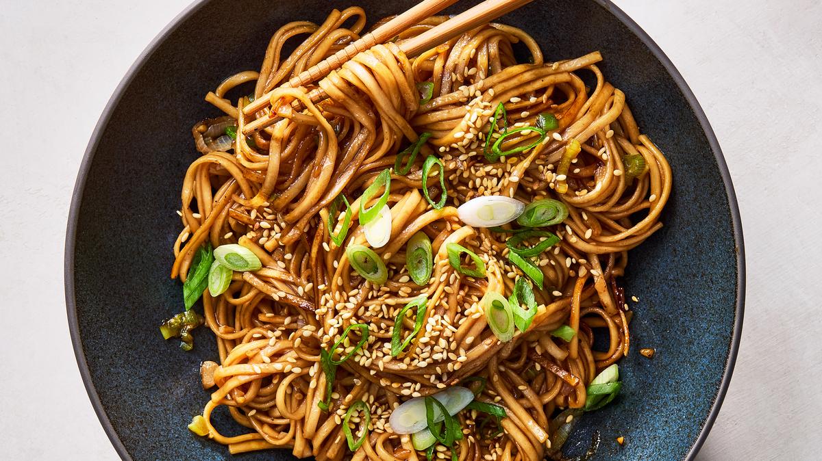 Hoisin garlic noodles. These noodles from Hetty Lui McKinnon make a powerful case for hoisin, the glossy, savory-sweet Cantonese sauce that is often used to glaze meat. Food styled by Monica Pierini. (Rachel Vanni/The New York Times)