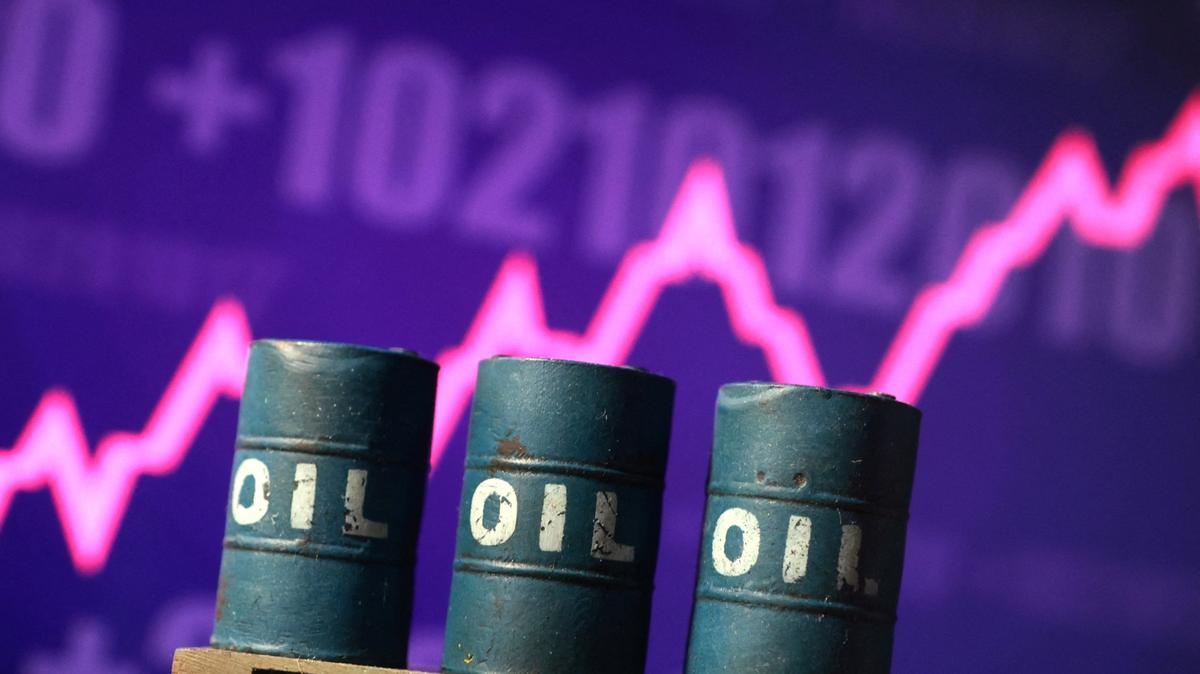 3D printed oil barrels and rising stock graph are seen in this illustration taken March 23, 2026. REUTERS/Dado Ruvic/Illustration