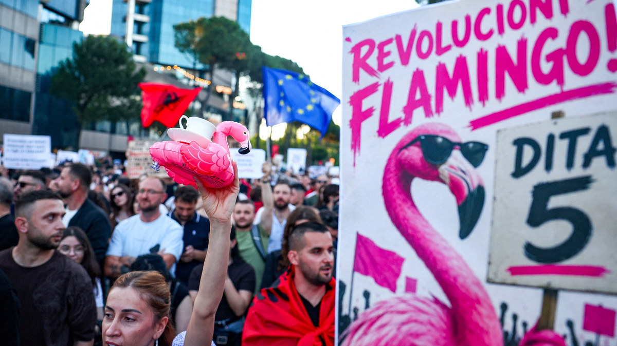 Protesters hold banners during a protest against a luxury resort development planned by a company linked with Donald Trump's son-in-law, Jared Kushner, on an environmentally sensitive part of the Adriatic coast, in Tirana, Albania, June 4, 2026. REUTERS/Florion Goga