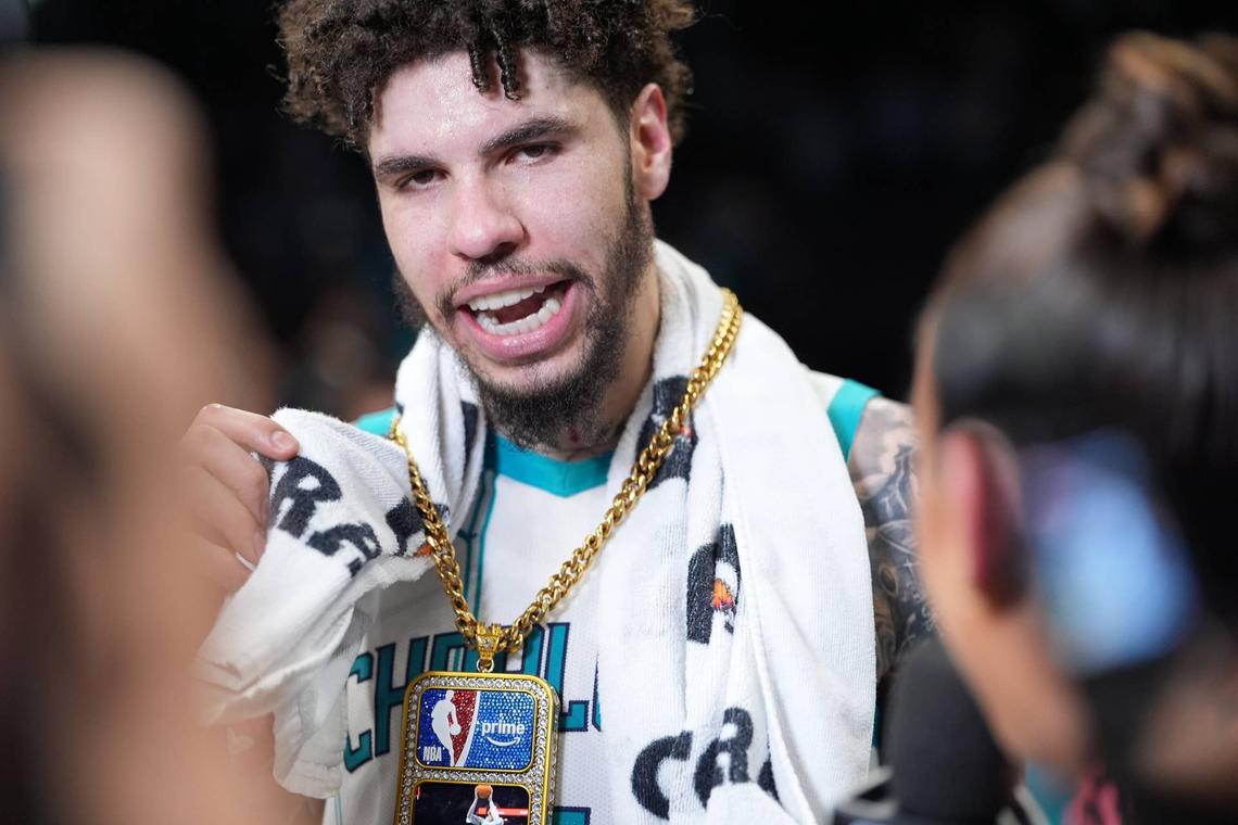  Apr 14, 2026; Charlotte, North Carolina, USA; Charlotte Hornets guard LaMelo Ball (1) is given a prime award after the second half overtime win during the play-in rounds between the Charlotte Hornets and the Miami Heat of the 2026 NBA Playoffs at Spectrum Center. Mandatory Credit: Jim Dedmon-Imagn Images 