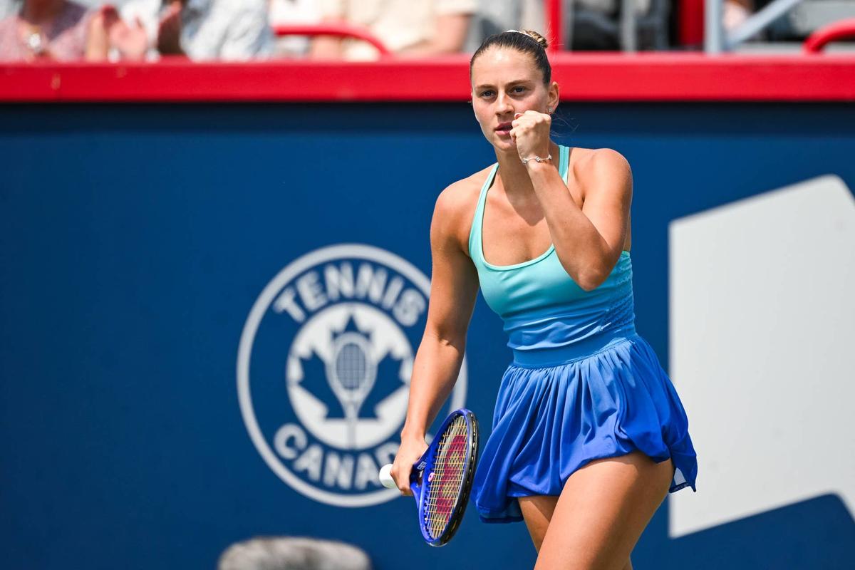  Aug 2, 2025; Montreal, QC, Canada; Marta Kostyuk (UKR) reacts after winning a point against Mccartney Kessler (USA) in fourth round play at IGA Stadium. Mandatory Credit: David Kirouac-Imagn Images 