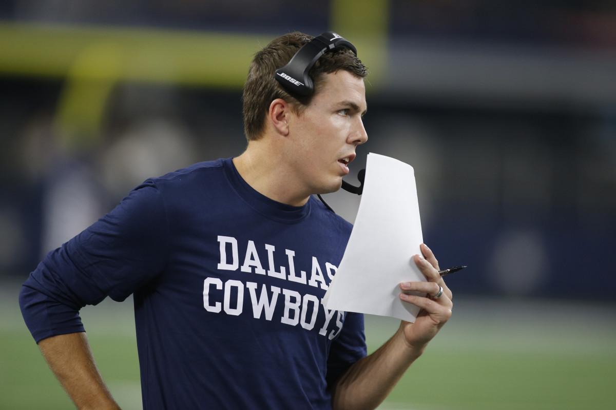 Dallas Cowboys offensive coordinator Kellen Moore on the field during the game against the Tampa Bay Buccaneers .