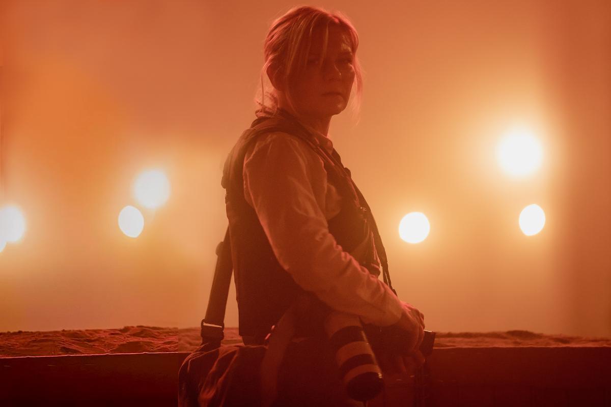 Kirsten Dunst stars as photojournalist “Lee” in the film “Civil War,” directed by Alex Garland and produced by A24. May 13, 2022. The dystopian war drama is set in an alternative version of the present, where America is being ravaged by a civil war.