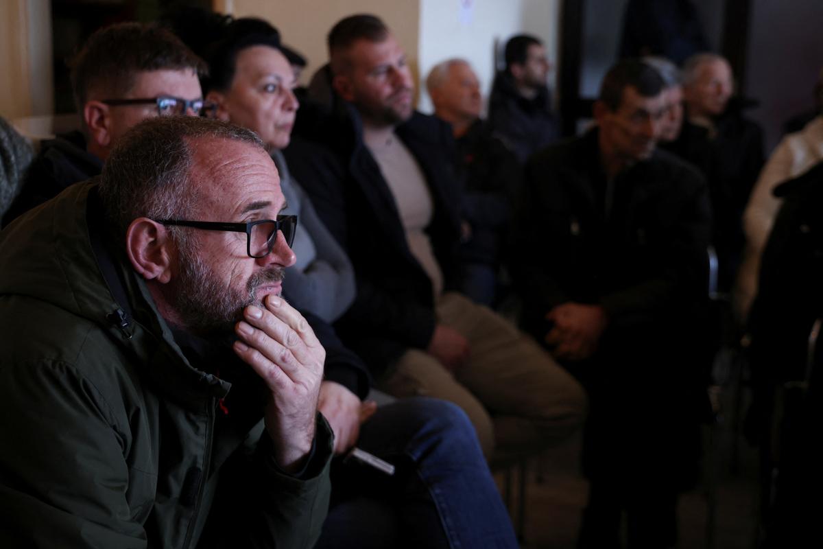 Concerned residents of the village of Przici attend a meeting where the harmful effects of lead in the body are demonstrated, in Vares, Bosnia and Herzegovina, February 21, 2026. Recent tests have detected lead in the blood of more than 300 nearby residents, fueling fear and uncertainty about the future of the town. REUTERS/Amel Emric