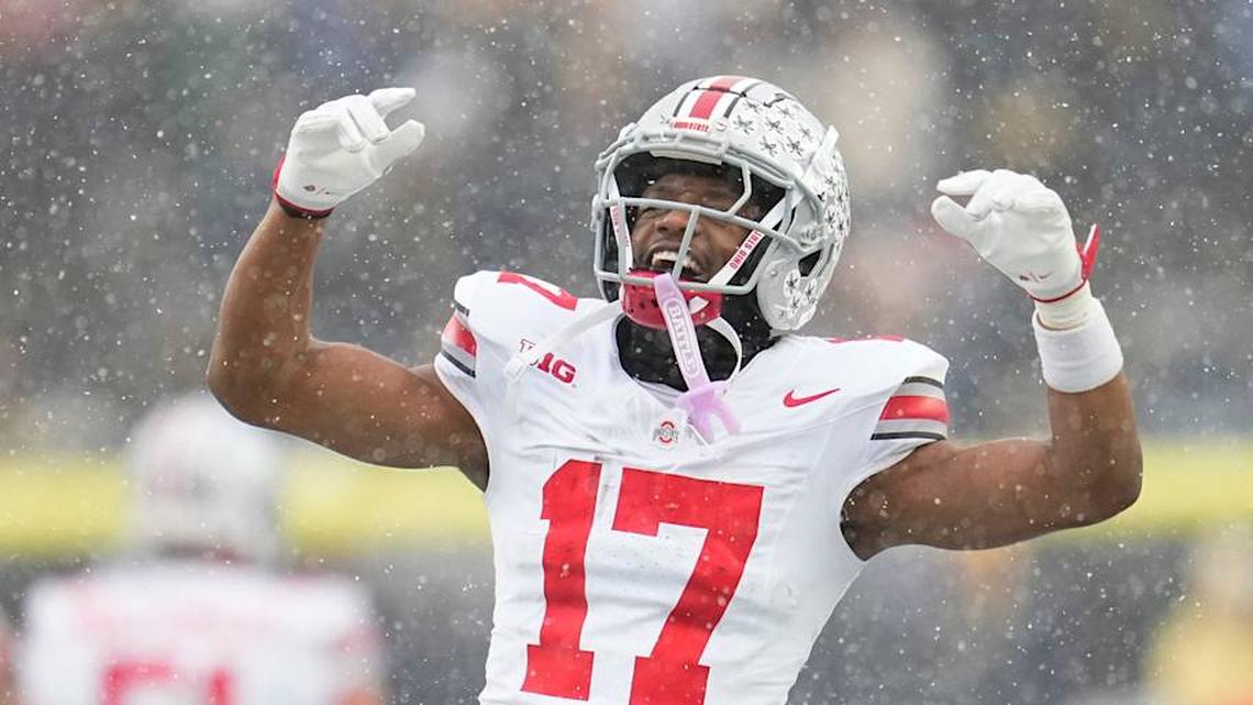  Ohio State Buckeyes wide receiver Carnell Tate (17) celebrates during the NCAA football game against the Michigan Wolverines at Michigan Stadium in Ann Arbor, Mich. on Nov. 29, 2025. Ohio State won 27-9. | Adam Cairns/Columbus Dispatch / USA TODAY NETWORK via Imagn Images 