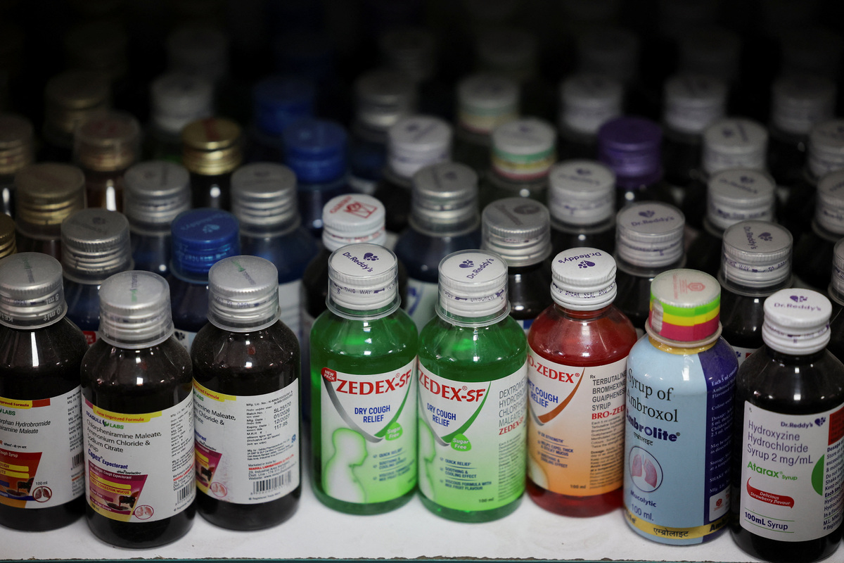 Bottles of cough syrup stand on a shelf at a chemist's in New Delhi, India, June 16, 2026. REUTERS/Anushree Fadnavis