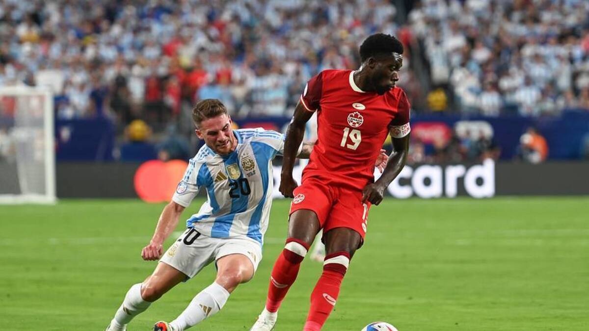  Alphonso Davies (right) played twice for Canada against Argentina in the 2024 Copa América. | Stephen Nadler/ISI Photos/Getty Images 