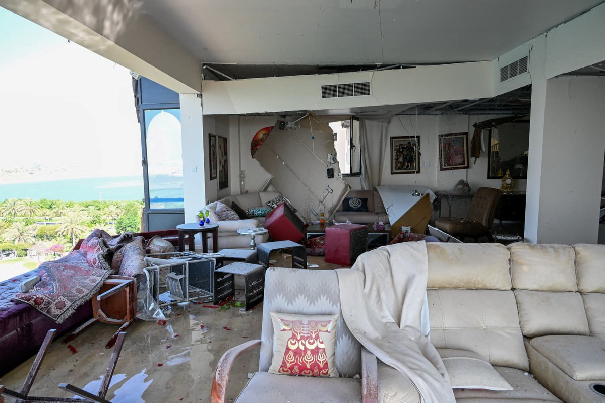A damaged apartment in a residential building, which according to the Bahraini Interior Ministry, was hit by an Iranian drone, in Muharraq, Bahrain, June 28, 2026. Bahrain Police Media/Handout via REUTERS