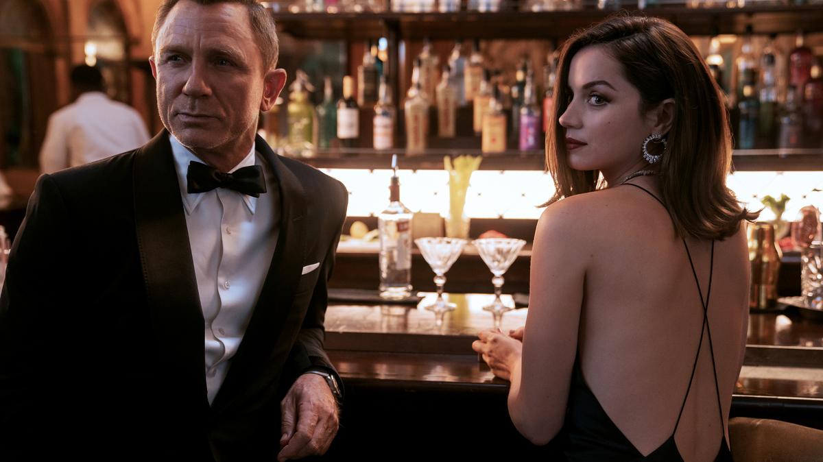 This image released by Metro Goldwyn Mayer Pictures shows Daniel Craig, left, Ana de Armas in a scene from “No Time To Die.”