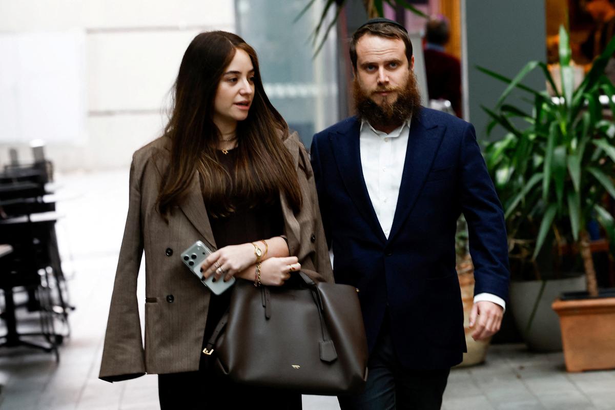 Sheina Gutnick (left), whose father was killed in the Bondi Beach mass shooting, arrives to give evidence at a hearing of the Royal Commission on Antisemitism and Social Cohesion, in Sydney, Australia, May 4, 2026. REUTERS/Izhar Khan
