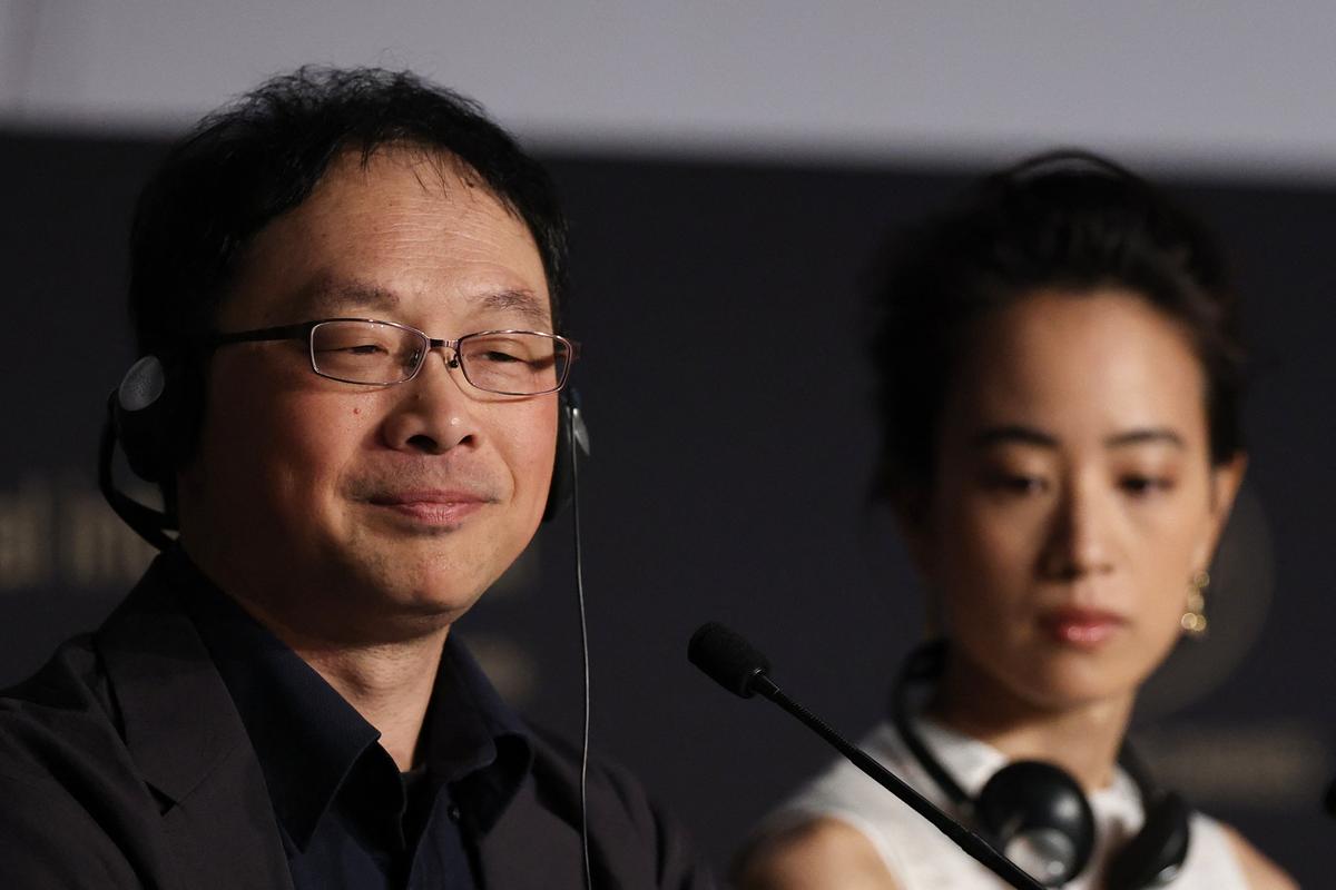 Director Koji Fukada and cast member Shizuka Ishibashi attend a press conference for the film "Nagi Notes" (Quelques jours a Nagi) in competition at the 79th Cannes Film Festival in Cannes, France, May 14, 2026. REUTERS/Manon Cruz