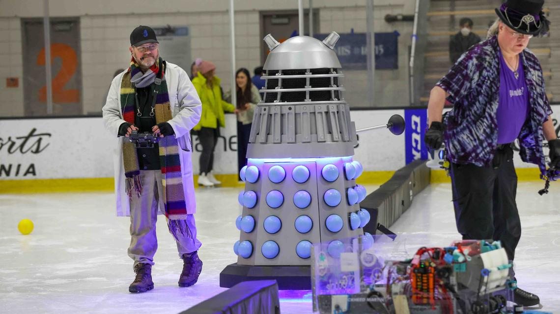 Andre Maley of Fairfax, left, controls Dalekand, a replica robot from the Doctor Who show, during the Robots on Ice event at Sharks Ice San Jose in San Jose, Calif., on Saturday, April 24, 2026. (Ray Chavez/Bay Area News Group)