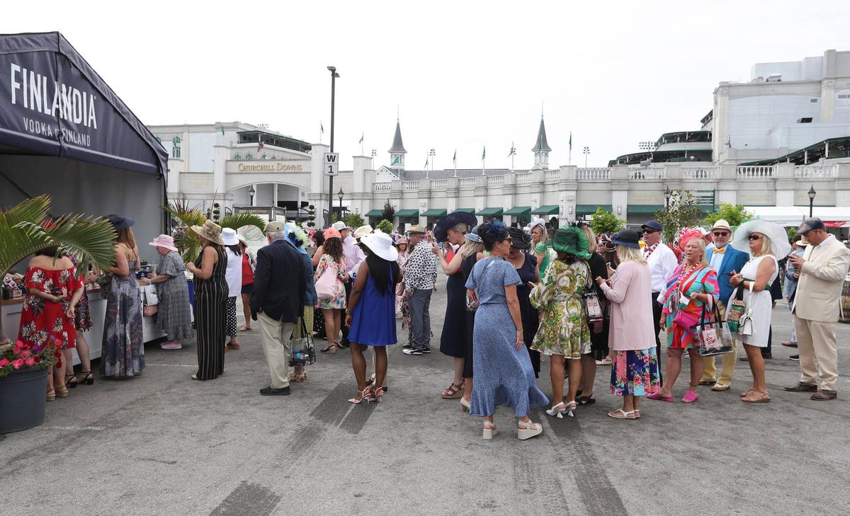  Race fans line up for cocktails on Kentucky Derby Day at Churchill Downs in Louisville, Ky. on May 6, 2023. 