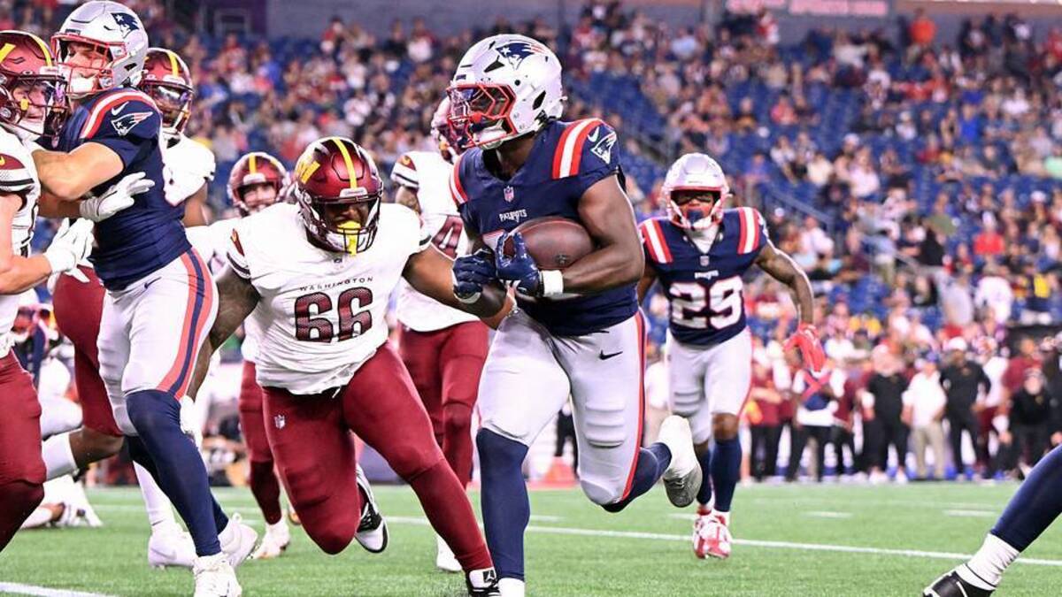  Aug 8, 2025; Foxborough, Massachusetts, USA; New England Patriots running back Terrell Jennings (26) scores a touchdown against the Washington Commanders during the second half at Gillette Stadium. Mandatory Credit: Brian Fluharty-Imagn Images | IMAGN IMAGES via Reuters Connect 
