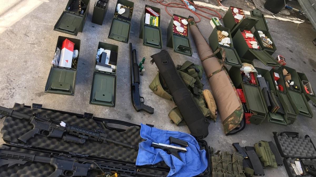 Illegal high-capacity magazines and an assault rifle along with multiple guns, ammunition are seen in this Long Beach Police Department (LBPD) photo in Long Beach, California, U.S., released on August 21, 2019.    Courtesy LBPD/Handout via REUTERS    ATTENTION EDITORS - THIS IMAGE HAS BEEN SUPPLIED BY A THIRD PARTY.
