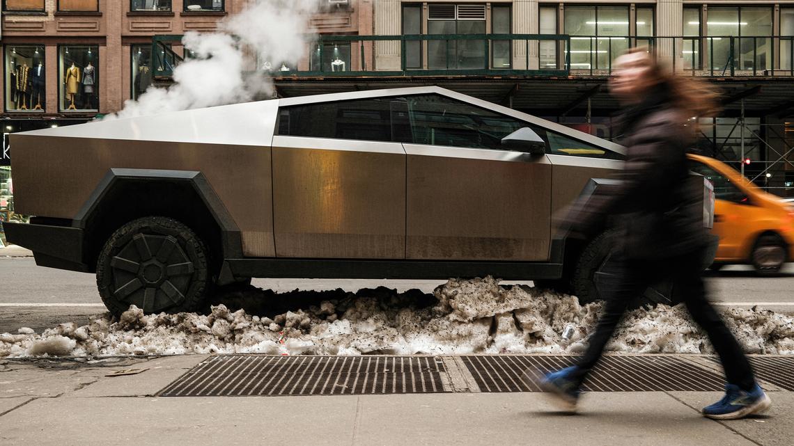 Lone survivor of fiery Cybertruck crash was trapped by electronic doors, lawsuit says 