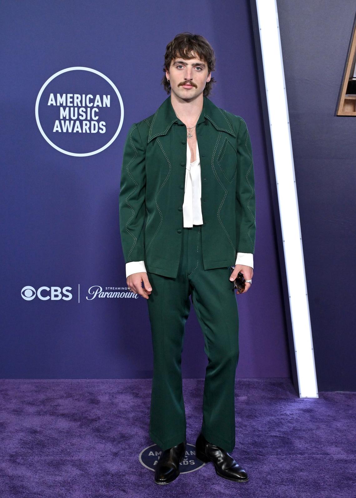 Benson Boone Benson Boone paired a hunter green look with black shoes. Axelle/Bauer-Griffin/FilmMagic