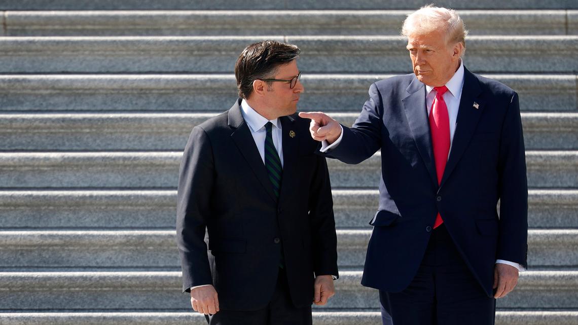 President Donald Trump with House Speaker Mike Johnson, R-La., while departing the U.S. Capitol on March 12.