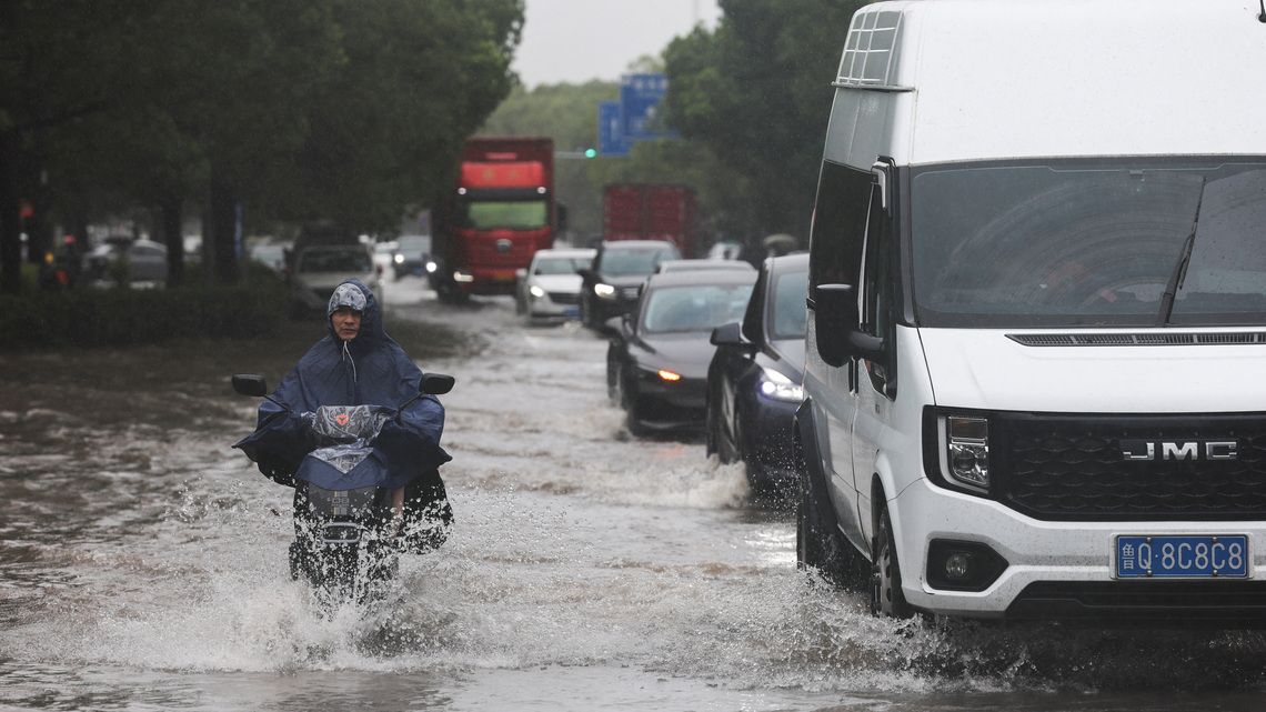 Typhoon Dolphin floods central China, puts Beijing on alert for heavy rain 