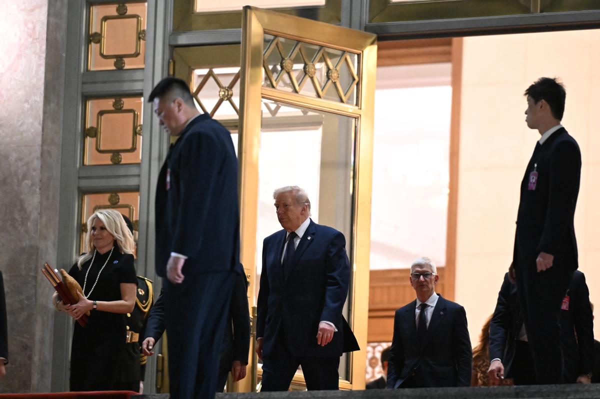 President Donald Trump departs the Great Hall of the People in Beijing after a state banquet with President Xi Jinping of China, on Thursday, May 14, 2026. Trump invited Xi to Washington in September as the two leaders emphasized their cooperation against the ornate backdrop of the Great Hall of the People. (Kenny Holston/The New York Times)..