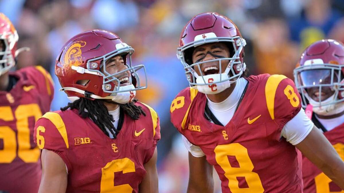  Oct 11, 2025; Los Angeles, California, USA; USC Trojans wide receiver Ja'Kobi Lane (8) is congratulated by wide receiver Makai Lemon (6) after catching a touchdown pass in the first half against the Michigan Wolverines at United Airlines Field at the Los Angeles Memorial Coliseum. | Jayne Kamin-Oncea-Imagn Images 