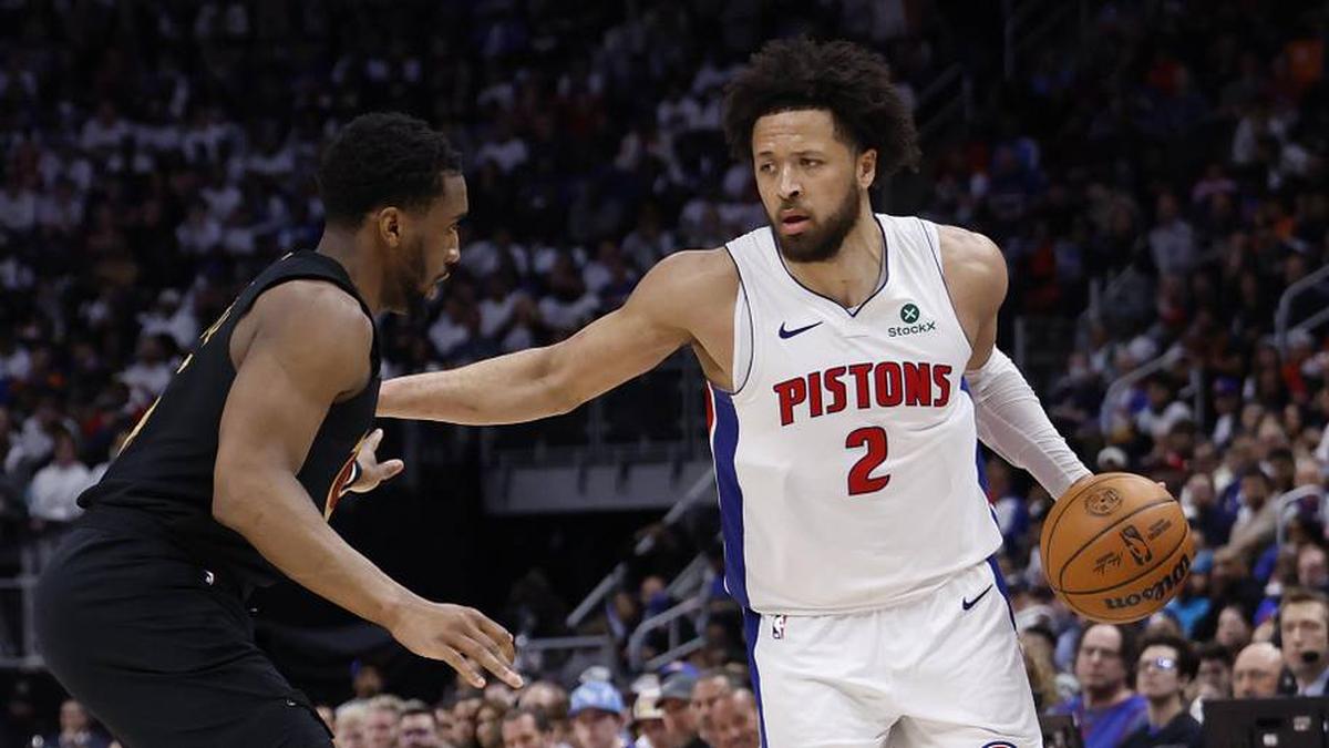  May 5, 2026; Detroit, Michigan, USA; Detroit Pistons guard Cade Cunningham (2) is defended by Cleveland Cavaliers guard Donovan Mitchell (45) in the second half during game one of the second round of the 2026 NBA Playoffs at Little Caesars Arena. | Rick Osentoski-Imagn Images 