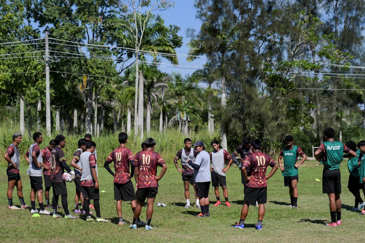Players from Esporte Clube Originarios, a team composed entirely of Indigenous athletes, train ahead of a session in preparation for the Campeonato Carioca de Futebol - Serie C, in Marica, Rio de Janeiro, Brazil, April 30, 2026. REUTERS/Tita Barros