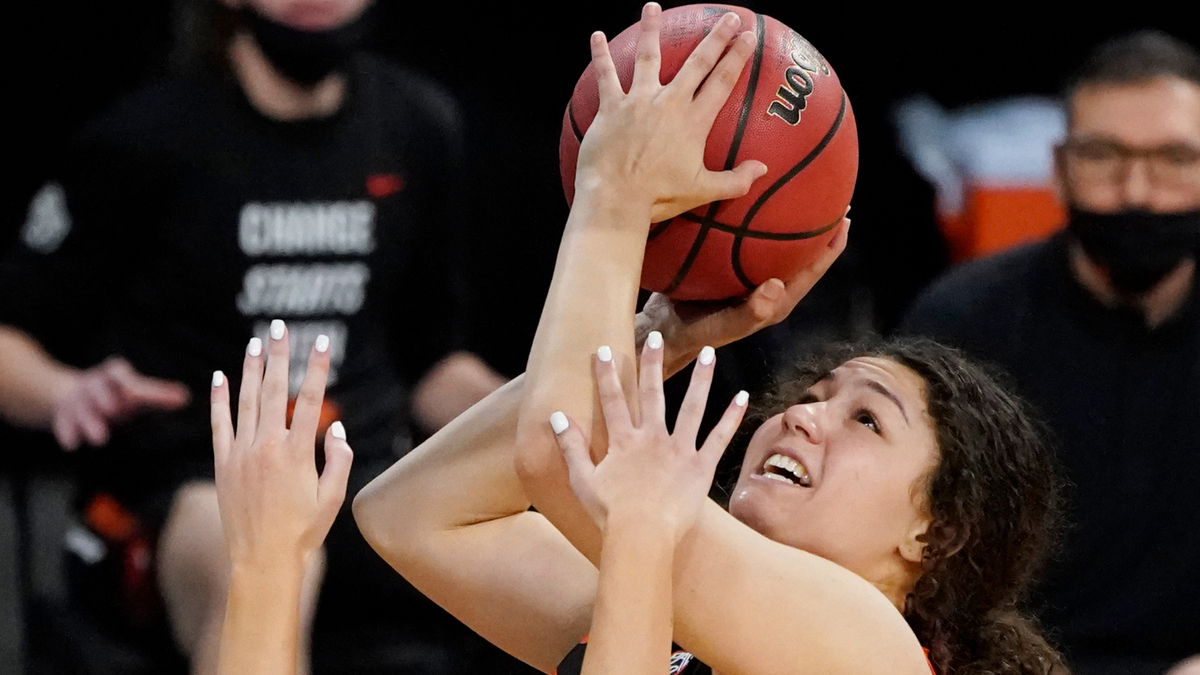FILE - Oregon State’s Talia Von Oelhoffen (22) shoots during an NCAA college basketball game in the second round of the Pac-12 women’s tournament in Las Vegas in March 2021.