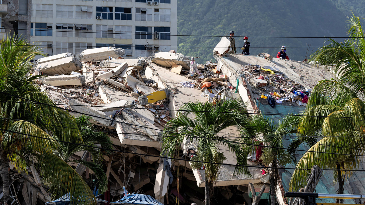 A damaged building is seen from the base camp of the French Civil Security Training and Intervention Regiment (UIISC 7) at the Karting La Guaira complex in Caraballeda, La Guaira state, Venezuela, on June 27, 2026, as they assist with rescue operations following earthquakes. MIGUEL MEDINA/Pool via REUTERS
