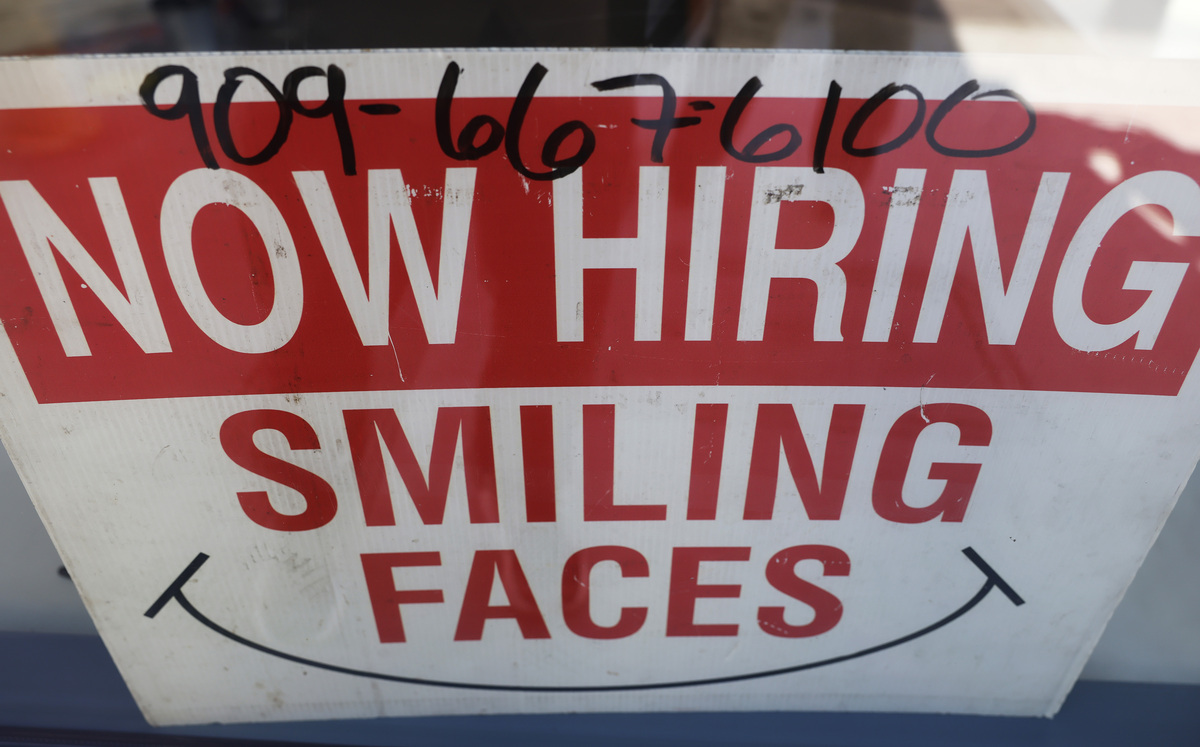  A “Now Hiring” sign posted in a shop in Pasadena, California, on March 6, 2026. 