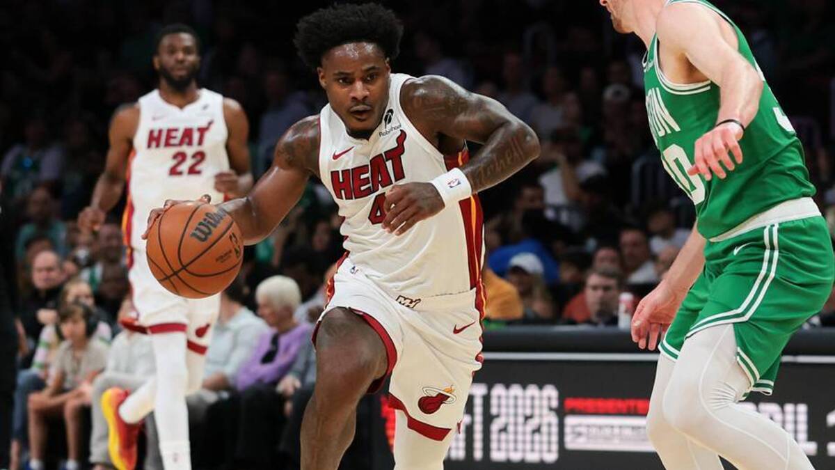 Apr 1, 2026; Miami, Florida, USA; Miami Heat guard Davion Mitchell (45) drives to the basket against Boston Celtics forward Sam Hauser (30) during the first quarter at Kaseya Center. Mandatory Credit: Sam Navarro-Imagn Images | Sam Navarro-Imagn Images 