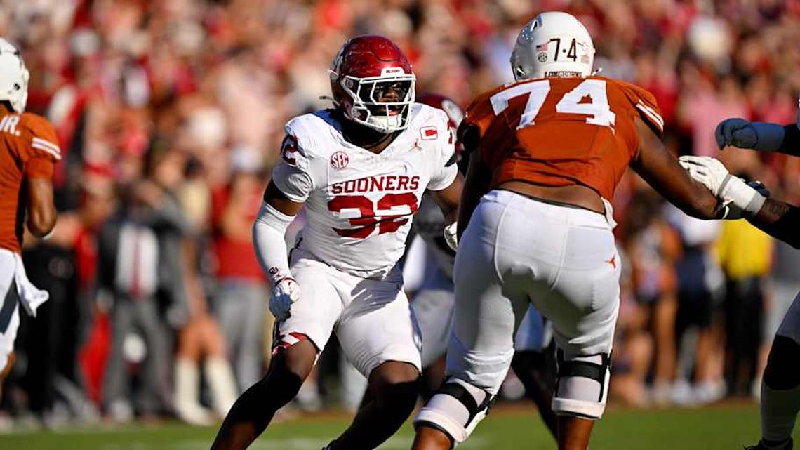 Oct 11, 2025; Dallas, Texas, USA; Texas Longhorns offensive lineman Trevor Goosby (74) blocks Oklahoma Sooners defensive lineman R Mason Thomas (32) during the game between the Texas Longhorns and the Oklahoma Sooners at the Cotton Bowl. Mandatory Credit: Jerome Miron-Imagn Images | Jerome Miron-Imagn Images 