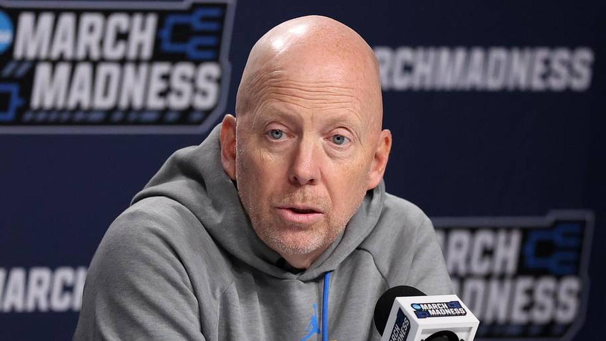  Mar 19, 2026; Philadelphia, PA, USA; UCLA Bruins head coach Mick Cronin speaks with the media before a practice session ahead of the first round of the men's 2026 NCAA Tournament at Xfinity Mobile Arena. Mandatory Credit: Bill Streicher-Imagn Images | Bill Streicher-Imagn Images 