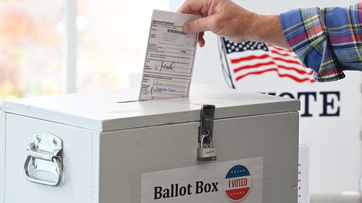 A man drops his ballot into the ballot box as early voting continues at Lakeville City Hall on Thursday, Oct. 27, 2022, in Minnesota. Starting Friday, June 26, 2026, the first ballots can be cast in Minnesota’s 2026 elections as early voting begins ahead of the Aug. 11 primary. Voters will pick party nominees for offices including U.S. Senate and governor for the November general election. (John Autey/Pioneer Press/TNS)