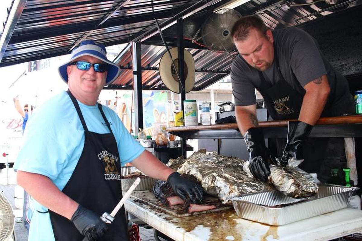  Men preparing the wild game at the cookoff. Photo credit: Visit Galveston 